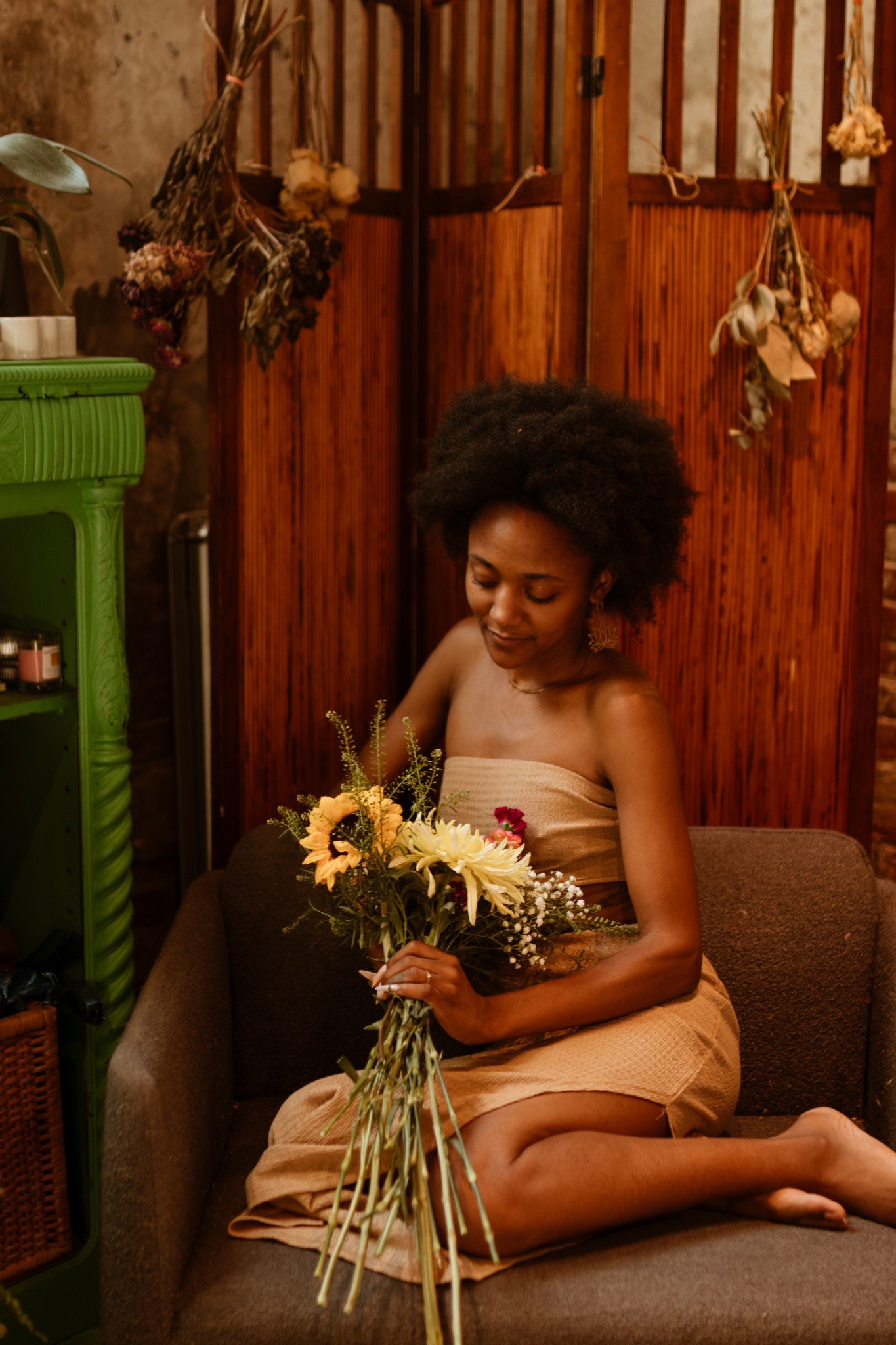 And So It Was cover: Torie Banks seated with a bouquet of flowers